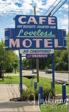 a motel sign with the words cafe loveless motel written on it's side