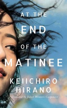 a woman with her hair blowing in the wind and text that reads, at the end of the matinee keiichiro hiranoo