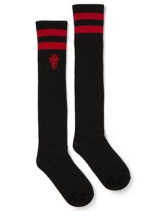 Add the perfect finishing touch to your next casual fit with these Black and Red Knee High Socks! These stylish black and red socks are the cozy and cute accessory that you've been waiting for. One size fits most Material: Polyester, spandex Care: Hand wash Imported Black Knee-high Socks For Winter Streetwear, Fitted Red Cotton Socks, Trendy Thigh High Black Socks, Trendy Black Cotton Knee-high Socks, Black Socks For Fall Streetwear, Black Socks For Winter Streetwear, Black Socks For Streetwear In Winter, Black Fall Streetwear Socks, Black Cotton Knee-high Socks For Winter