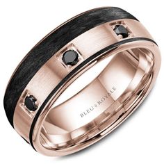 a black and rose gold wedding ring with diamonds