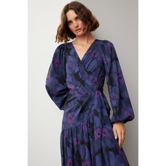 Purple floral crepe (100% Polyester). A-line. Long sleeves. V-neck. Tie closure. 58" from shoulder to hemline. Imported. Elegant A-line Floral Dress For Fall, Floral Print V-neck Dress For Spring Evening, Elegant Flowy V-neck Dress With Floral Print, Elegant Floral Print V-neck Evening Dress, Flowy V-neck Floral Dress For Fall, Flowy V-neck Midi Dress For Work, Chic V-neck Floral Dress For Fall, Formal Floral Print Dress With Surplice Neckline, Elegant Floral Print V-neck Dress For Fall