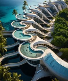 an aerial view of a building with water and palm trees in the foreground, surrounded by blue waters