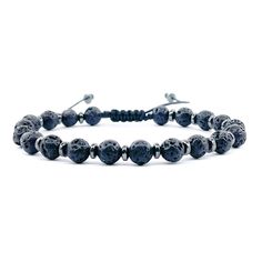 This elegant men's bracelet is made with Black Lava stones measuring 6mm, separated from each other by tiny 5mm Rondelle stone hematite separators, and strung on a black waxed thread made of 100% polyester.  It measures 6.5 inches or 16.5 cm. The closure is adjustable and can thus accommodate thicker wrists. If you believe it needs to be significantly larger or smaller, please let me know the wrist size and I will be happy to customize it for your order.  The standard size is ready to ship in 1-2 days. Custom pieces can take 3-4 business days to be shipped.  This is a special present for a special person. Because Lava stones are made from molten lava that has solidified under intense heat and pressure, they are known for symbolizing strength and courage. Paired with the Hematite stones, wh Adjustable Black Wristband With Gemstone Beads, Casual Black Lava Stone Bracelet, Adjustable Black Wristband With Natural Stones, Adjustable Black Bracelet With Natural Stones, Adjustable Silver Lava Stone Bracelets, Adjustable Black Lava Stone Bracelet, Casual Black Bracelets With Natural Stones, Spiritual Black Braided Bracelet With Round Beads, Black Lava Stone Bracelets With Gemstone Beads