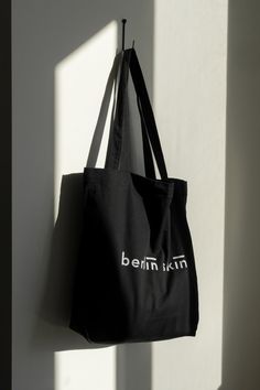 Our eco-friendly branded tote bag is made from organic cotton, making it the perfect blend of style and sustainability. Use it to pack your Berlin Skin on trips or as an everyday tote. Organic Reusable Canvas Bag For Everyday Use, Organic Everyday Reusable Canvas Bag, Organic Reusable Bag For Everyday Use, Recyclable Cotton Shoulder Bag For Travel, Eco-friendly Recyclable Canvas Tote Bag, Organic Recyclable Canvas Tote Bag, Organic Style Recyclable Canvas Tote Bag, Organic Tote Bag For Everyday, Organic Cotton Canvas Bag For Daily Use