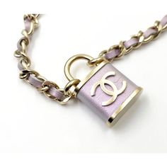 This is part of Chairish’s Costume Jewelry assortment.  Chanel Light Gold CC Lavender Lock Pendant Necklace   *Marked 18 *Made in Italy *Comes with the original box and pouch  -The  length is about 17". -The pendant is approximately 1.5" x 1" -In an excellent condition. There is a light scratch next to the cc. Luxury Pink Jewelry Collectible, Luxury Pink Collectible Jewelry, Luxury Adjustable Chain Jewelry Fashion Accessory, Luxury Jewelry With Adjustable Chain As Fashion Accessory, Luxury Lock Jewelry For Gift, Luxury Purple Pendant Necklace, Pink Jewelry With Logo Charm For Gifts, Luxury Purple Jewelry Gift, Designer Pink Jewelry For Formal Occasions