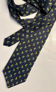 "Brooks Brothers \"346\" necktie. Delightful green umbrellas with a lt blue water droplet on a navy background. It's silky. (some ties have a slub or texture) All silk, made in USA. Measures 58 x 3 1/2." Navy Formal Ties For Summer, Blue Ties For Summer Gift, Blue Tie For Summer Gift, Blue Tie For Summer As A Gift, Blue Ties As Summer Gift, Green Umbrella, Santa Fe Style, Silk Gifts, Navy Background