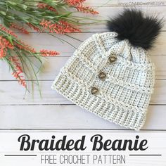 a crocheted beanie with a black pom - pom on top and text that reads, braided beanie free crochet pattern