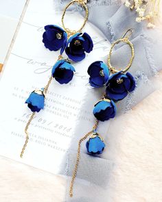 Navy Blue Gold Long Chain Wedding Earrings for Brides Fancy - Etsy Poland Navy Blue Drop Earrings, Elegant Dangle Flower Earrings For Party, Blue Flower Shaped Jewelry For Party, Blue Flower Earrings For Formal Occasions, Blue Drop Flower Earrings For Party, Elegant Formal Jewelry With Handmade Flowers, Elegant Blue Chandelier Earrings For Evening, Elegant Handmade Flower Drop Bridal Earrings, Elegant Handmade Flower Bridal Drop Earrings