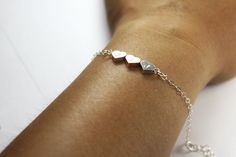 "Big sister little sister, forever we love.This dainty and simple three hearts bracelet are just ready for you to wear. Celebrate the Joy of family. This beautiful Gold or Silver three hearts bracelet jewelry is a perfect gift wedding occasion. A elegant way to personalize Bridesmaid outfit ! Best for causal bracelet too.Its so easy to stack with other bracelets .Great present for three Bridesmaids, three sisters, three best friends, girlfriends and brides. wedding jewelry, family necklace, pers Personalized Heart Bracelet For Best Friend Gift, Elegant Heart-shaped Bracelets For Best Friend, Personalized Minimalist Heart Bracelet For Best Friend, Personalized Heart Bracelet For Best Friend, Personalized Elegant Heart Bracelet For Best Friend, Minimalist Name Bracelet For Bridesmaid Gift, Minimalist Silver Name Bracelet For Bridesmaids, Dainty Sterling Silver Bracelet For Bridesmaid Gift, Elegant Heart Bracelet For Bridesmaid Gift