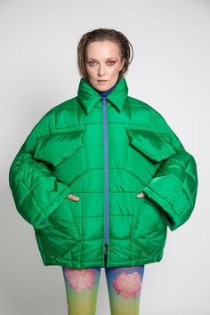 Unisex quilted jacket "Lupinus Green" features a round shoulder and oversized fit for a relaxed, comfortable feel. It's made from lightweight, wrinkle-free polyester and has large pockets, windproof, and water repellent properties. The soft, bold shape makes it a statement piece, and the hypoallergenic synthetic padding adds warmth without compromising style.Size Guide:ONE SIZE (fits to XS-XL)Collar - 51 cmWides middle line - 170 cmBottom line - 140 cmSleeve ends - 57 cmLength from the neckline Puff Jacket, Green Jacket, Wrinkle Free, Quilted Jacket, Water Repellent, Stella Mccartney, Size Guide, Collar, Green