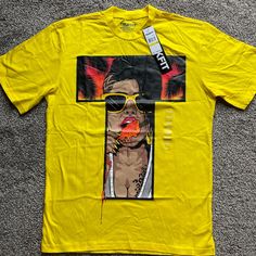 Brand New With Tags. Yellow Trukfit Graphic T Shirt. Multiple Sizes Available Tan T-shirt For Spring Streetwear, Trendy Tan Short Sleeve Shirt, Urban Style Yellow Cotton Tops, Tan Tops For Spring Streetwear, Urban Style Yellow Tops With Graphic Print, Fitted Yellow T-shirt With Graphic Print, Tan Shirt For Summer Streetwear, Urban Style Yellow Graphic Print Tops, Tan Shirt With Graphic Print For Streetwear