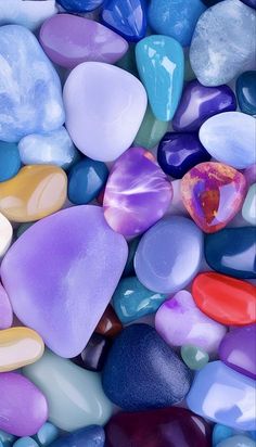 many different colored rocks and pebbles together