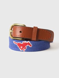 DESCRIPTION:Leather belt with a Southern Methodist University needlepoint motif.FEATURES:BeltHand-Stitched NeedlepointFull Grain, Vegetable Tanned Italian LeatherSolid Brass BuckleWidth: 1 in. Needlepoint Belt, Southern Methodist University, Needlepoint Belts, Saint Bernard, Needlepoint, Leather Belt, Grain, University, Brass