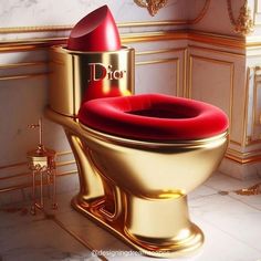 a golden toilet with a red seat in a bathroom