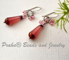 Czech glass faceted dangle drop earrings look vintage with pink semi-translucent glass beads trimmed in gold. Glass Crystal Earrings, Czech Glass Earrings, Creative Earrings, Czech Glass Jewelry, Bead Projects, Translucent Glass, Jewelry Boutique, Red Jewelry, Bead Store