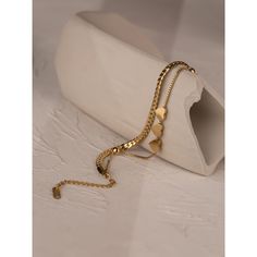 Feel the luxury of this timeless yet modern layered bracelet made with a delicate gold metallic chain link and adorned with an exquisite heart charms. This beautiful piece is perfect for adding a touch of subtle elegance to any ensemble. Details Item Type: Fashion Bracelets Metal Type: Stainless Steel+Gold Plated Chain Length: 16.3+6.0cm Gold Heart Bracelet, Layered Bracelet, Romantic Heart, Layered Chain, Handcrafted Bracelets, Gold Bracelet Chain, Layered Bracelets, Bracelet For Women, Metal Bracelets