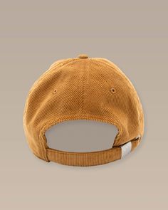 Add vintage vibes to your accessory collection with our retro-inspired corduroy hat. Made with breathable cotton and a soft crown, this hat is great for travel days or afternoons on the pier. The leather strap is fashioned with Skipjack branding on the metal adjuster, and two versatile colorways pair well with coastal attire. Style: 11263 Brown Cap For Everyday, Brown Cap For Everyday Wear, Brown Dad Hat, One Size, Everyday, Brown Dad Hat For Everyday Use, Brown Dad Hat For Everyday Wear, Vintage Brown Travel Hat, Casual Brown Flat Cap Baseball Cap, Adjustable Everyday Hats, Casual Brown Flat Cap