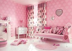 a pink room with hearts on the wall and curtains, rugs and furniture in it