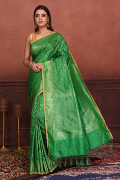 Buy green Katan silk Banarasi saree online in USA with zari work. Look your best on festive occasions in latest designer sarees, pure silk sarees, Kanchipuram silk sarees, handwoven sarees, tussar silk sarees, embroidered sarees from Pure Elegance Indian clothing store in USA.-full view Green Pre-draped Saree With Meenakari For Puja, Festive Green Pre-draped Saree With Zari Weaving, Green Semi-stitched Pre-draped Saree With Meenakari, Green Pre-draped Saree With Zari Weaving For Diwali, Green Bollywood Pre-draped Saree With Meenakari, Green Paithani Silk Pre-draped Saree With Self Design, Festive Green Paithani Silk Pre-draped Saree, Green Semi-stitched Paithani Silk Saree, Green Pre-draped Saree With Zari Work In Katan Silk