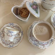 tea cups and saucers on a table