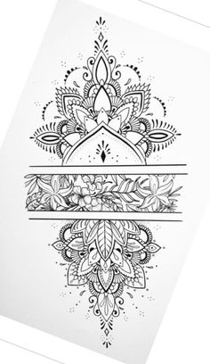 a black and white drawing of an ornate design