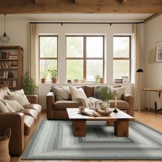 a living room filled with furniture and lots of windows