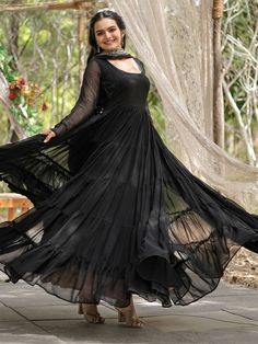 This enchanting black georgette reception wearing a plain gown with a dupatta is a stunning piece that will make you stand out at any event. Made from high-quality georgette material, this gown is designed to make you feel elegant and confident. The similar color georgette dupatta features rich sequins embroidered work and designer lace work, adding a touch of glamour to your overall look.
This gown includes a 5-layer frill design, fully stitched and available in XS to XXL sizes. With a 12-meter Black Georgette Party Dress, Black Georgette Dress For Festive Occasions, Party Black Anarkali Set With Sheer Dupatta, Black Floor-length Anarkali Set For Wedding, Black Floor-length Gown For Party Wear, Black Georgette Floor-length Anarkali Set, Black Georgette Anarkali Set Floor-length, Black Party Wear Dupatta For Formal Occasions, Black Georgette Anarkali Set With Dupatta