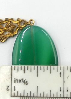 "Vintage gold tone and large green agate necklace ( A ), In good vintage condition. Necklace 18\" long, 2\" Extended. Green agate 1\"3/8 x 7/8 and 5 mm thick. 1\" ¼ x 7/8\" and 5 mm thick. Weighs 1.1 Oz. Thanks." Formal Gold Jade Necklaces, Formal Gold Jade Necklace, Green Oval Necklace For Formal Occasions, Formal Green Oval Necklace, Oval Jade Gold Necklace, Jade Cabochon Oval Pendant Necklace, Green Cabochon Oval Pendant Necklace, Handmade Gold Green Onyx Necklaces, Handmade Green Onyx Gold Necklace