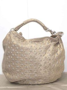 Auth JIMMY CHOO Shoulder Bag Metallic Gold Beige Description Condition: A (Great condition Light signs of use with tiny scratches and / or stains) Condition: B (Good condition but signs of small scratches and / or stains) General : signs of wear, dullness Bottom/Corner : scratches Handle : crack, wrinkle, color fade Hardware : scratches Color : Metallic Gold Beige Dust bag Material : Vintage leather (suede) Size approx. : H38cm × W34 / 45cm × D12cm / Handle Length 34cm Payment We only accept Pay Pre-owned Leather Bags, Pre-owned Leather Shoulder Bag For Everyday Use, Pre-owned Top Handle Leather Bags, Pre-owned Leather Tote Bag, Pre-owned Leather Shoulder Bag For Daily Use, Pre-owned Luxury Leather Shoulder Bag, Pre-owned Leather Shoulder Bag, Luxury Everyday Pre-owned Shoulder Bag, Lighted Signs