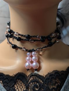 Embrace elegance with this stunning black onyx crystal beaded necklace. Handmade and uniquely designed, this layered statement piece features delicate pink pearl accents, making it the perfect accessory for any outfit. Whether dressing up for a special occasion or adding a touch of sophistication to your everyday look, this necklace is crafted to provide timeless beauty and versatility. Made with high-quality materials to ensure durability, it's both a stylish and meaningful addition to your jewelry collection. Treat yourself or surprise a loved one with this exquisite piece. This simple design makes it easy to dress up or down for any occasion. measuring 46 inches this beautiful necklace can be worn in many different styles and will make a fantastic addition to your wardrobe. *My goal is Black Onyx Crystal, Crystal Beaded Necklace, Onyx Crystal, Crystal Bead Necklace, Beautiful Necklace, Pink Pearl, Necklace Handmade, Statement Jewelry, Black Onyx