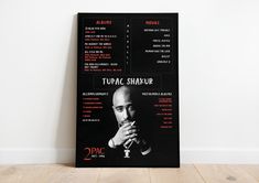 a poster on the wall that is advertising an upcoming show, tupac shavur