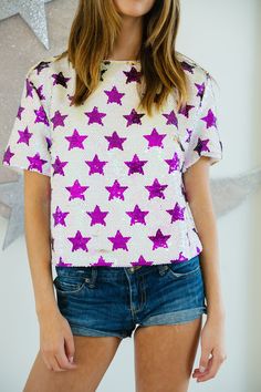 PURPLE STAR SEQUIN TOP TOP Judith March Star Print Tops For Night Out In Spring, Fitted Star Print Top For Night Out, Fitted Star Print Tops For A Night Out, Summer Tops With Star Print For Night Out, Summer Purple Sequined Tops, Purple Summer Top For Night Out, White Star Print Short Sleeve Top, Purple Top For Summer Night Out, Purple Summer Tops For Night Out