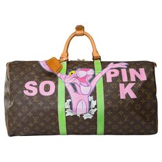 Trendy​​ ​​Customized​​ ​​"Pink​ ​is​ ​so​ ​cute"​​ ​​Louis​​ ​​Vuitton​​ ​​Keepall​​ ​​55​​ ​​travel​​ ​​bag​​ ​​in​​ ​​brown​​ ​​Monogram​​ ​​canvas​​ ​​"​​ ​​by​​ ​​the​​ ​​fashionable​​ ​​Street​​ ​​Art​​ ​​artist​​ ​​PatBo Gold​​ ​​metal​​ ​​trim,​​ ​​double​​ ​​leather​​ ​​handle​​ ​​for​​ ​​hand​​ ​​carry Double​​ ​​zip Signature:​​ ​​"Louis​​ ​​Vuitton​​ ​​Paris​​ ​​Made​​ ​​in​​ ​​France​​ ​​" Dimensions:​​ ​​55x31x26​​ ​​cm​​ ​​​​ ​​​​ ​​(21,6x12,2x10,2​​ ​​Inches) Reference:​​ ​​101287 General​​ ​​condition:​​ ​​7/10 Sold​ ​with​ ​address​ ​holder​ ​and​ ​handle​ ​clamp In​​ ​​very​​ ​​good​​ ​​general​​ ​​condition​​ ​​despite​​ ​​wear​​ ​​marks​​ ​​on​​ ​​the​​ ​​canvas,​​ ​​leather​​ ​​(patina,​​ ​wear)​​ ​​and​​ ​​trim​​ ​​(scratches) Biography:​​​ ​​​PatBo​​​ ​​​is​​​ ​​​a​ Louis Vuitton Personalized, Louis Vuitton Airport Bag, Chanel Fall 2014, Louis Vuitton Keepall 55, Louis Vuitton Paris, Louis Vuitton Store, Chic Crossbody Bag, Purse Crafts, Louis Vuitton Keepall