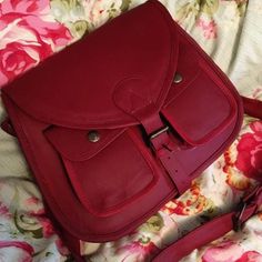 "Cross body Saddle Bag, Red Leather,bags purses,Purse, CrossBody Purse, leather Shoulder Bag Belt closure Soft fabric lined interior with two slip pockets and one zip close pocket Two snap button pockets under closing flap on front exterior PLEASE SEE MEASUREMENTS Measures:  W 12\" x H 11\" x Depth 3\" Straps: Drop 24\" Excellent condition.This is new /old stock and has never been used. Really nice perfectly clean inside and out. 242-273-105+280+87+dn Cross body Saddle Bag, Red Leather,bags purses,Purse, CrossBody Purse, leather Shoulder Bag" Red Leather-lined Satchel For Travel, Burgundy Leather-lined Crossbody Shoulder Bag, Burgundy Leather Lining Crossbody Shoulder Bag, Burgundy Leather Crossbody Shoulder Bag, Red Flap Bag For Travel, Red Leather Saddle Bag Shaped As Satchel, Burgundy Satchel Shoulder Bag With Leather Lining, Red Leather Saddle Bag In Satchel Shape, Red Leather Satchel Saddle Bag