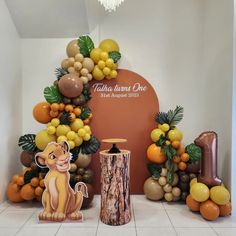 the lion king themed birthday party with balloons and decorations