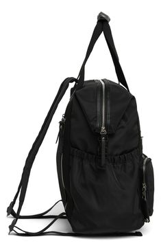 A modern backpack with padded straps and multiple pockets ensure your essential gear is secure when you're on the go. 11"W x 13 1/2"H x 7 1/4"D; 37 3/4" strap drop Textile Imported Back To School Nylon Backpack With Zipper, Black Backpack With Adjustable Straps For On-the-go, Trendy Nylon Bag With Anti-theft Pocket, Trendy Nylon Bags With Anti-theft Pocket, Nylon Backpack With Zipper Closure, Versatile Backpack With Zipper Closure For Back To School, Versatile Backpack With Zipper For Back To School, Standard Nylon Backpack With Zipper Closure, Versatile Backpack For Back To School With Zipper Closure