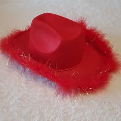 New, Never Used Light Up Red Felt Structured Cowgirl Hat With Feather Trim (Silver Tinsel Intertwined With Red Feathers). Adjustable Toggle On Cord To Keep Hat Securely In Place. Hat Is 15" L, 12" W, 6" H With An Inside Head Circumference Of 23". Rim Lights Up! Great For Halloween, Football Games, 4th Of July, And Christmas Parades! Red Cowgirl Hat, Halloween Football, Hat With Feather, Rim Light, Silver Tinsel, Christmas Parade, Red Feather, Cowgirl Hat, Feather Trim