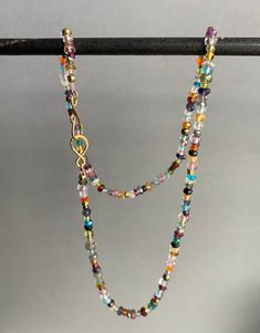 This multi gemstone necklace features bright and stunning natural stones strung on silk thread. It ends with a gold filled handmade hook and eye clasp. Each necklace will be created just for you! Multicolor Gemstone Beads Lariat Necklace, Multicolor Lariat Necklace With Gemstone Beads, Multicolor Single Strand Jewelry For Healing, Multicolor Multi-strand Necklace For Healing, Spiritual Multicolor Single Strand Crystal Necklace, Multicolor Gemstone Beaded Lariat Necklace, Multicolor Lariat Beaded Necklaces With Natural Stones, Bohemian Rainbow Crystal Necklaces With Faceted Beads, Bohemian Rainbow Crystal Necklace With Faceted Beads