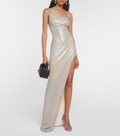 Sequined One Shoulder Gown in Silver - The Sei | Mytheresa Glamorous One-shoulder Dress With Asymmetrical Neckline, Glamorous Evening Dress With Fitted Bodice And Asymmetrical Neckline, Glamorous Maxi Dress With Side Slits For Wedding, Glamorous Wedding Maxi Dress With Side Slits, One-shoulder Glamorous Sequin Prom Dress, Glamorous One-shoulder Sequin Prom Dress, Elegant One Shoulder Backless Dress For Gala, Strapless Evening Dress With Side Slits For Gala, Glamorous One Shoulder Floor-length Evening Dress