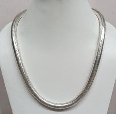 Handmade Solid round sterling silver chain necklace, made in india. The Indian snake chain, also known as the "Naga chain," has a long history dating back to ancient India. It is characterized by its flexible and tubular design, resembling the body of a snake. This type of chain has been used for centuries in traditional Indian jewelry, particularly in South India. The snake chain is often made of silver, and its unique design allows it to sit comfortably around the neck or wrist. It is a popula Silver Snake Shape Necklace With Clavicle Chain, Sterling Silver Necklace With Large Pendant And Snake Chain, Silver Snake Chain Necklace, Nickel Free, Nickel-free Silver Snake Chain Necklace, Silver Snake Chain Necklace, 16 Inch, Traditional Indian Jewellery, Indian Jewellery Design, Silver Snake Chain, Sterling Silver Chain Necklace