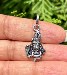 925 Sterling Silver Weight and dimensions can be seen in the images Entirely handcrafted by local artisans. Highly oxidized look. Lord Shiva with Damru, Beautiful Design For our other products, pls check our shop and follow us for new updates- https://www.etsy.com/in-en/shop/ArtisanCraftedJewelz Artisan Silver Jewelry With Lobster Clasp, Symbolic Sterling Silver Jewelry With Lobster Clasp, Small Symbolic Handmade Jewelry, Traditional Silver Jewelry With Charms, Sterling Silver Jewelry For Festivals And Gifts, Sterling Silver Jewelry For Festivals As A Gift, Sitting Shiva, Local Artisans, Lord Shiva