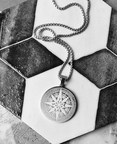 《《  SYMBOLIC COLLECTION  》》 THE DETAILS The "MARITIME COMPASS MEDALLION" Necklace is designed with an exquisitely detailed Silver Stainless Steel Maritime Compass Medallion Pendant, hung from a Silver Stainless Steel Box Chain available in your choice of length! THE SYMBOL 🧭 COMPASS: Known as a symbol of "TRAVEL, DIRECTION, & ADVENTURE" often worn or gifted to symbolize two souls traveling together on the same path in life, one being lost without the other. 🔷️💠🔷️View our entire SYMBOLIC COLLECTION here: https://www.etsy.com/shop/mrmackjewelry/?section_id=27090591 MATERIALS * 1 1/2" Diameter Silver Stainless Steel Maritime Compass Medallion Pendant  * 3mm Silver Stainless Steel Box Chain  * Silver Stainless Steel Lobster Clasp ⤵️NOTE: Stainless Steel is an Oxygen Resistant Metal, which Vintage Stainless Steel Necklaces With Box Chain, Vintage Stainless Steel Box Chain Necklaces, Vintage Stainless Steel Box Chain Jewelry, Silver Medallion Necklace With Chain As Gift, Vintage Stainless Steel Jewelry With Compass Design, Vintage Medallion Stainless Steel Necklaces, Vintage Medallion Stainless Steel Necklace, Vintage Stainless Steel Medallion Necklace, Compass Pendant Necklace