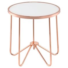 a round table with metal legs and a glass top