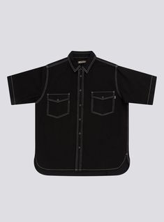 The Homie Shirt in Black Denim is designed to be your next trans-seasonal wardrobe staple constructed from 100% Cotton Denim with contrast stitching and black stud buttons. Layer it up over a tee or tank for a more casual look and button it up when the formalities kick in. Double chest pockets Black stud buttons Constructed from 100% Cotton Denim Black Top With Button Closure For Streetwear, Black Buttoned Top For Streetwear, Casual Collared Tops With Contrast Stitching, Black Edgy Tops With Pockets, Casual Cotton Shirt With Contrast Stitching, Casual Fitted Tops With Contrast Stitching, Urban Black Button-up Top, Casual Black Shirt With Snap Buttons, Edgy Black Top With Buttons