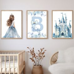 three framed pictures on the wall above a crib