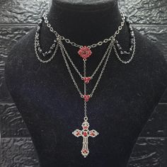 Handmade gothic necklace with black beads, chain, red connectors and red cross. Gothic Cross Chain Jewelry, Gothic Jewelry With Adjustable Chain And Cross Pendant, Gothic Jewelry With Cross Pendant And Adjustable Chain, Red Punk Choker As Gift, Gothic Cross Pendant Clavicle Chain Necklace, Gothic Cross Jewelry With Adjustable Chain, Gothic Clavicle Chain Necklace With Cross Pendant, Gothic Cross Pendant Jewelry For Halloween, Red Gothic Jewelry For Party