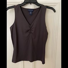 Nwot Ann Taylor Brown Stretchy V-Neck Top Never Worn Gathered V- Neck Detail - See Photo Machine Washable 95% Nylon/ 5% Spandex Casual Fitted Sleeveless V-neck Top, Stretchy Tops, V Neck Tops, Ann Taylor, Womens Tops, Spandex, V Neck, Women Shopping, Color