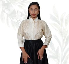 Organza Barong Tagalog Blouse for women, a sophisticated blend of tradition and modern elegance. Crafted from luxurious organza fabric, this blouse features intricate embroidery that pays homage to classic Filipino craftsmanship. The lightweight and sheer texture of the organza adds a delicate touch, while the carefully designed patterns enhance the blouse's timeless appeal. The Barong Tagalog silhouette is tailored to provide a flattering fit, with a subtle V-neckline and elegant button-down fr Elegant Organza Blouse Piece, Elegant Evening Blouse With Resham Embroidery, Elegant Long Sleeve Blouse With Intricate Embroidery, Elegant Blouse With Intricate Embroidery, Traditional Evening Blouse In Organza, Elegant Unstitched Organza Blouse Piece, Formal Organza Blouse Piece, Embroidered Organza Blouse For Wedding, Elegant Long Sleeve Festive Blouse Piece