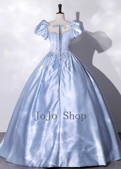 This beautiful pastel blue satin ball gown wedding dress is sure to enchant your guests. Featuring puff short sleeves, it provides a classic and elegant look worthy of any Cinderella-themed princess. The soft satin material is comfortable to wear and designed to last. Boning and bra padding Lace-up closure Floor length Ball Gown Petticoat recommended Blue Fairytale Wedding Gown, Princess Style Light Blue Ball Gown For Debutante Ball, Princess Style Blue Ball Gown For Formal Occasions, Princess Style Light Blue Ball Gown For Prom Season, Princess Style Satin Gown For Debutante Ball, Light Blue Ball Gown With Fitted Bodice For Wedding, Princess Style Satin Ball Gown, Blue Satin Ball Gown For Wedding, Debutante Ball Satin Ball Gown