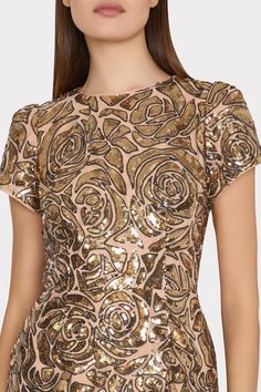 Our signature floral sequin design is embroidered atop mesh throughout this stunning short sleeved minidress with an uneven scalloped hem—a standout piece in our Holiday collection. Every time you wear it you’ll feel special, without sacrificing comfort. Glamorous Short Sleeve Dresses For Gala, Glamorous Short Sleeve Sequin Dress With Contrast Sequins, Glamorous Short Sleeve Sequin Dress With Contrast, Glamorous Short Sleeve Contrast Sequin Dress, Embellished Short Sleeve Gala Dresses, Fitted Mini Dress With Rose Detail For Evening, Short Sleeve Party Dress With Floral Embroidery, Short Sleeve Floral Embroidered Party Dress, Short Sleeve Floral Embroidery Party Dress